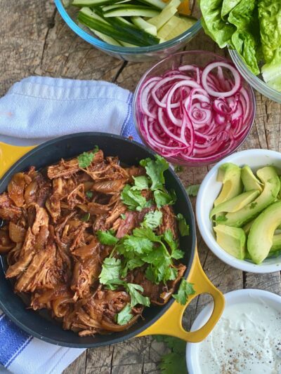 Pulled pork with pickled onions, avocado and soured cream